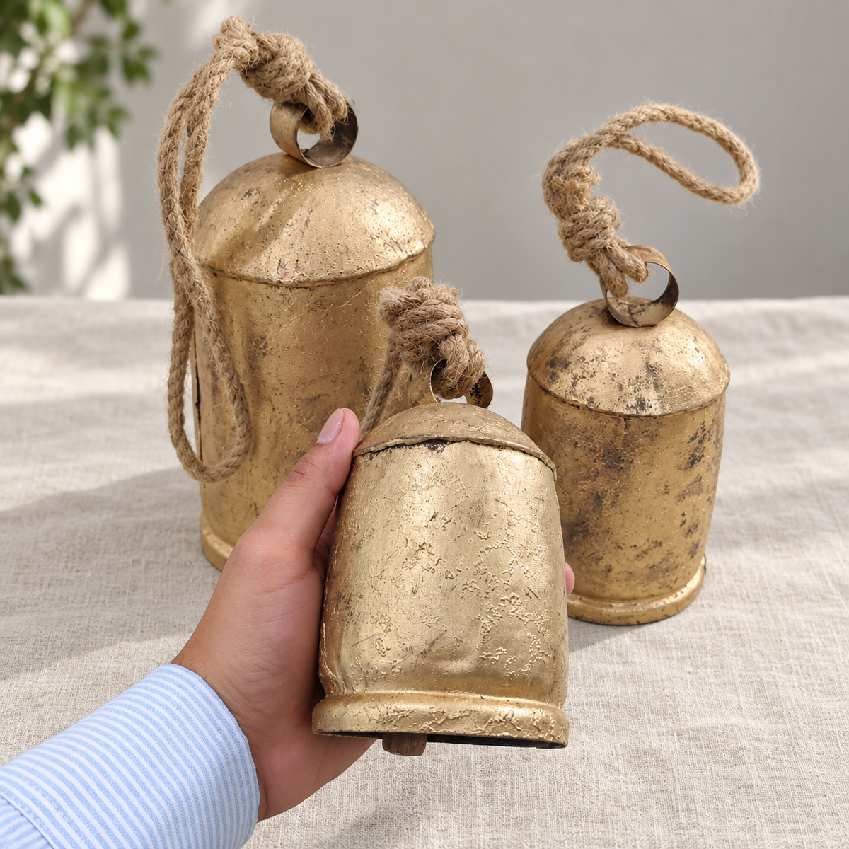 Large Rustic Bells — Set of 3 with a rustic gold-tone finish and natural jute ropes