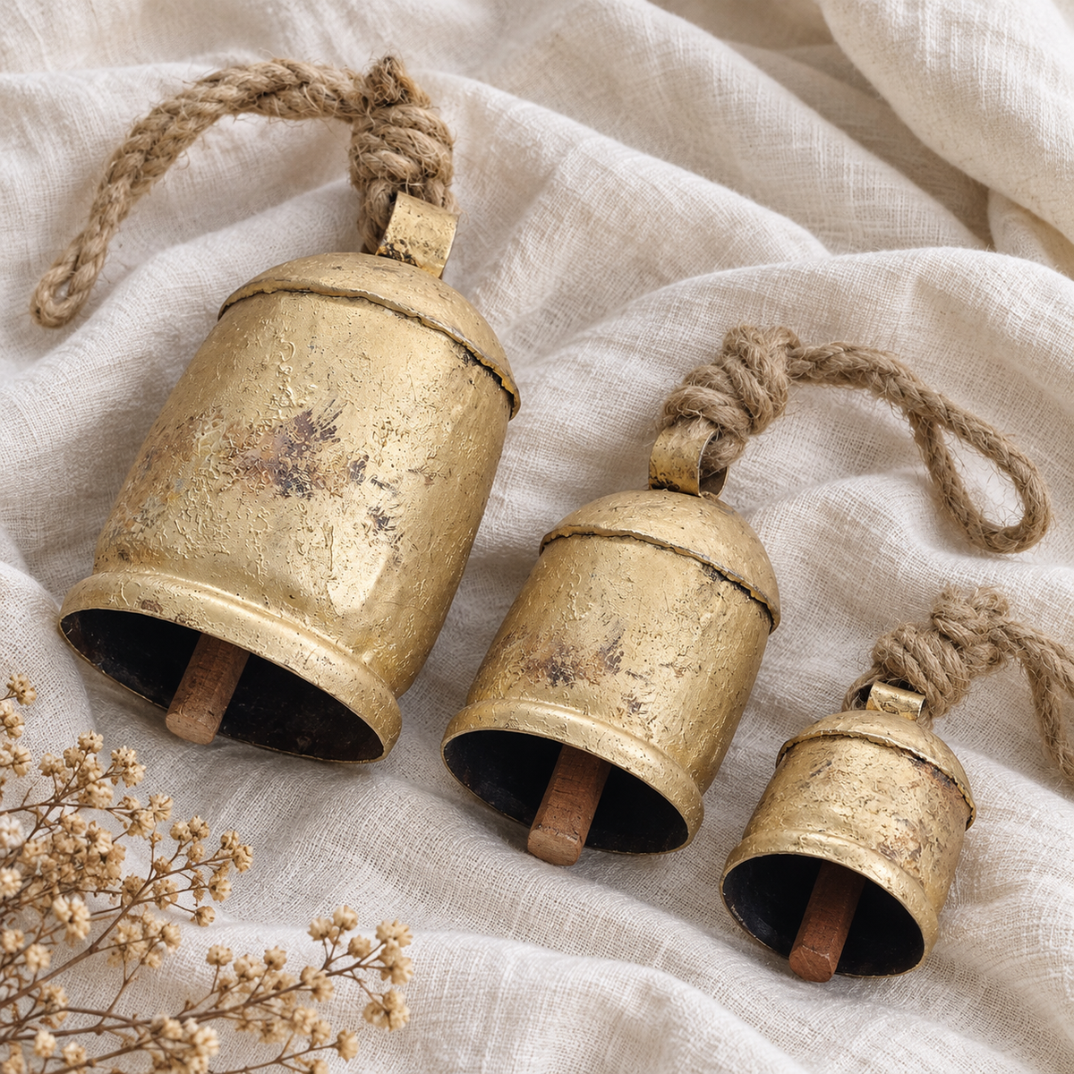 Petite Rustic Bells — Set of 3 with a rustic gold-tone finish and natural jute ropes