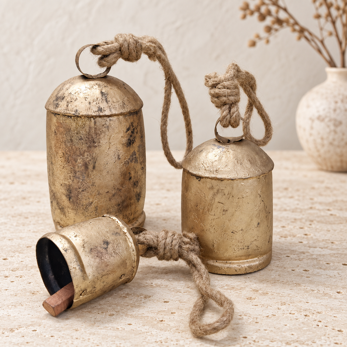 Graduated Rustic Bells — Set of 3 with a rustic gold-tone finish and natural jute ropes