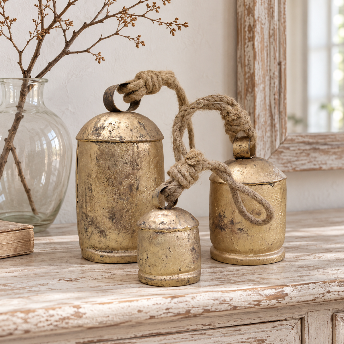 Graduated Rustic Bells — Set of 3 with a rustic gold-tone finish and natural jute ropes